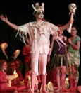 King of the Dead wearing a crown of bones and carrying a skull